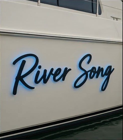 River Song custom LED brass boat name letters on luxury yacht hull